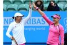 EASTBOURNE, ENGLAND - JUNE 22:  Nadia Petrova of Russia (R) and partner Katarina Srebotnik of Slovenia celebrate winning their women's doubles final match against Monica Niculescu of Romania and Klara Zakopalova of Czech Republic on day eight of the AEGON International tennis tournament at Devonshire Park on June 22, 2013 in Eastbourne, England.  (Photo by Jan Kruger/Getty Images)